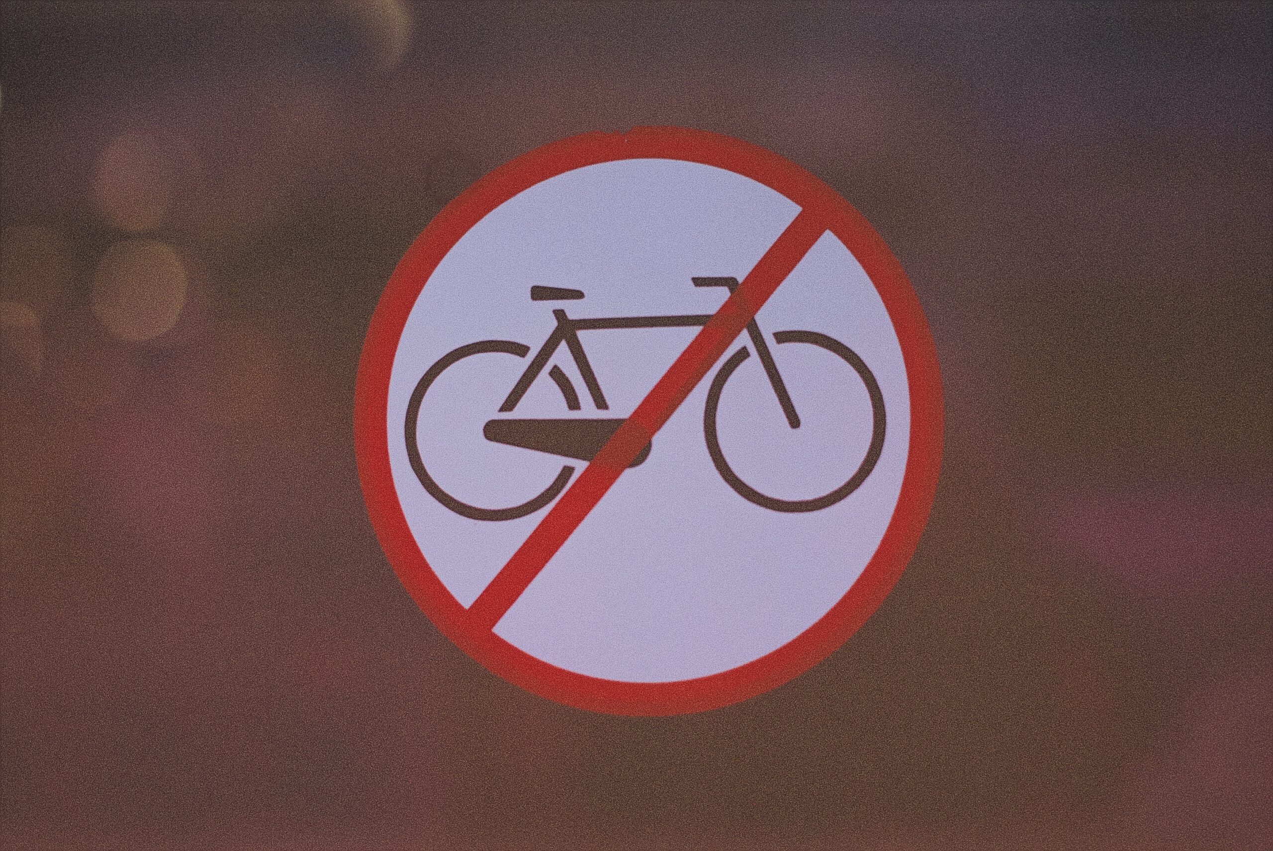 Visual representation of prohibited hazardous items like aerosols and fireworks.