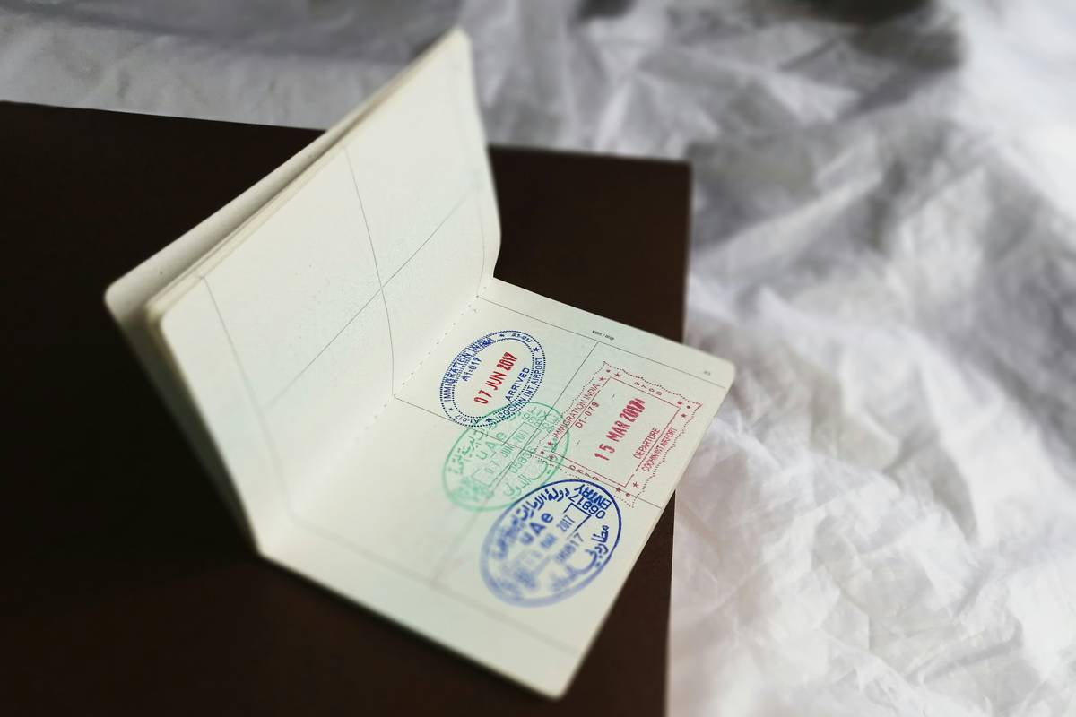 Photo of someone organizing documents for an insurance claim.