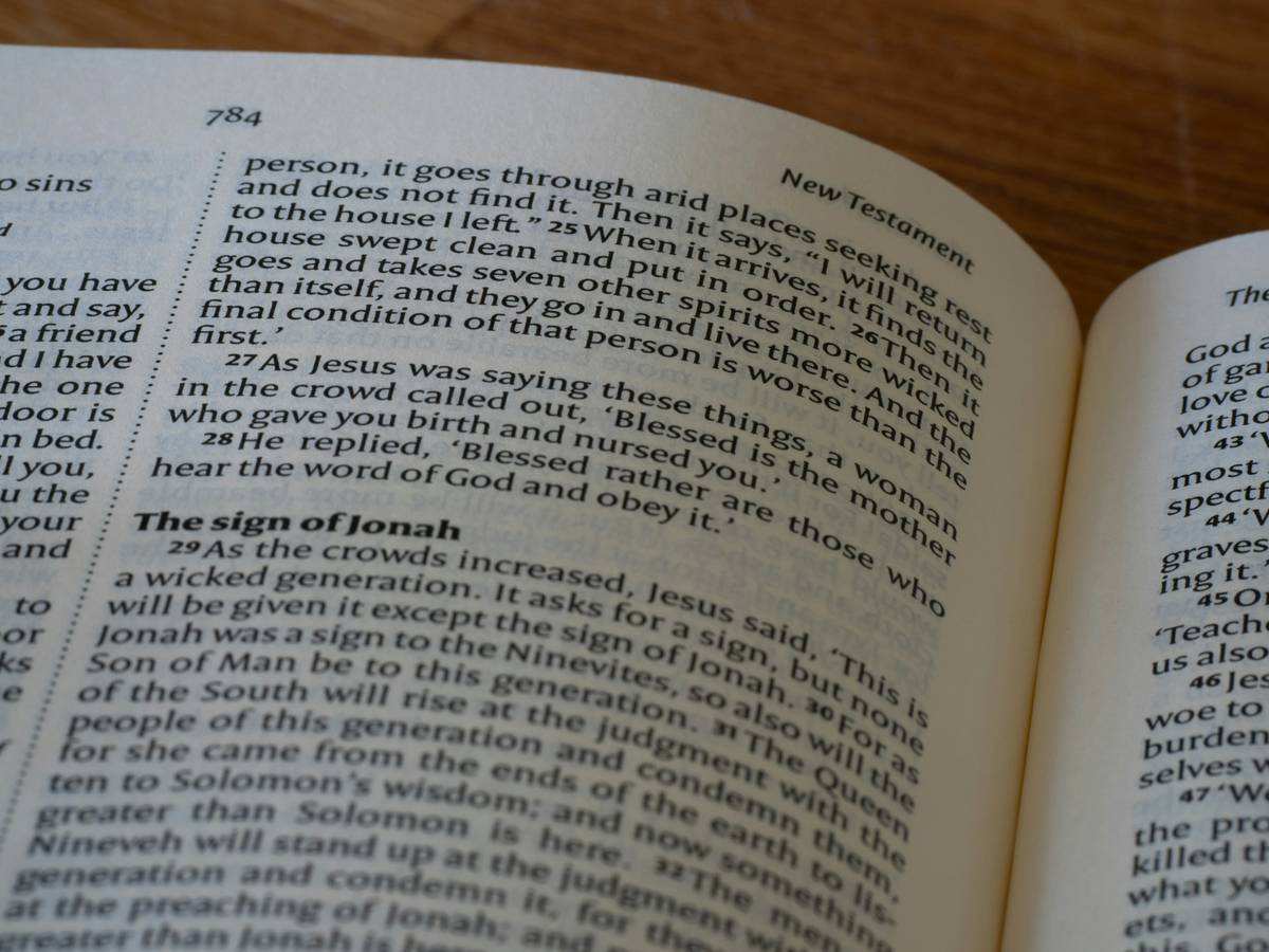 Airline passengers waiting at the lost luggage counter